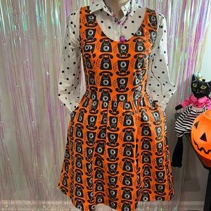 Blue Platypus, black cat telephone orange dress, small